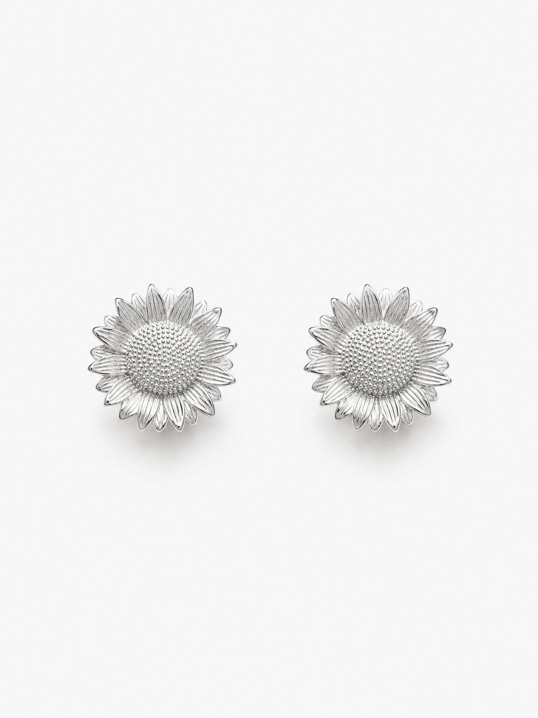 Arete Flor girasol  plata laminada