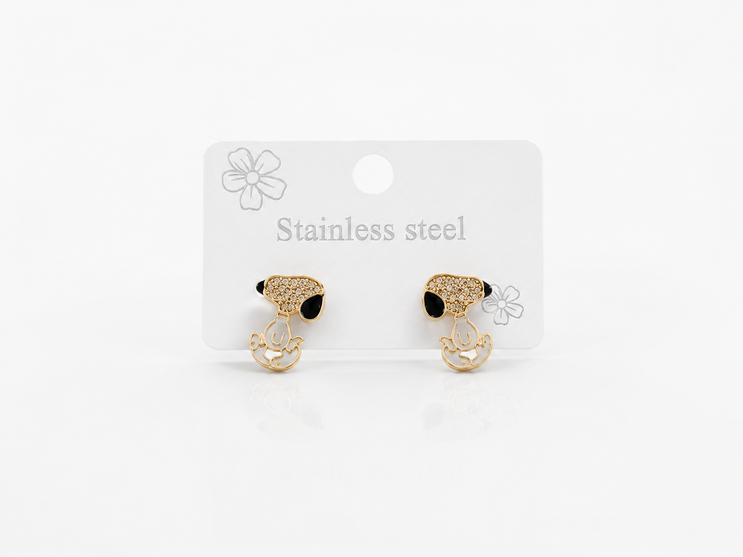 Arete Snoppy circonea esmaltado  oro laminado