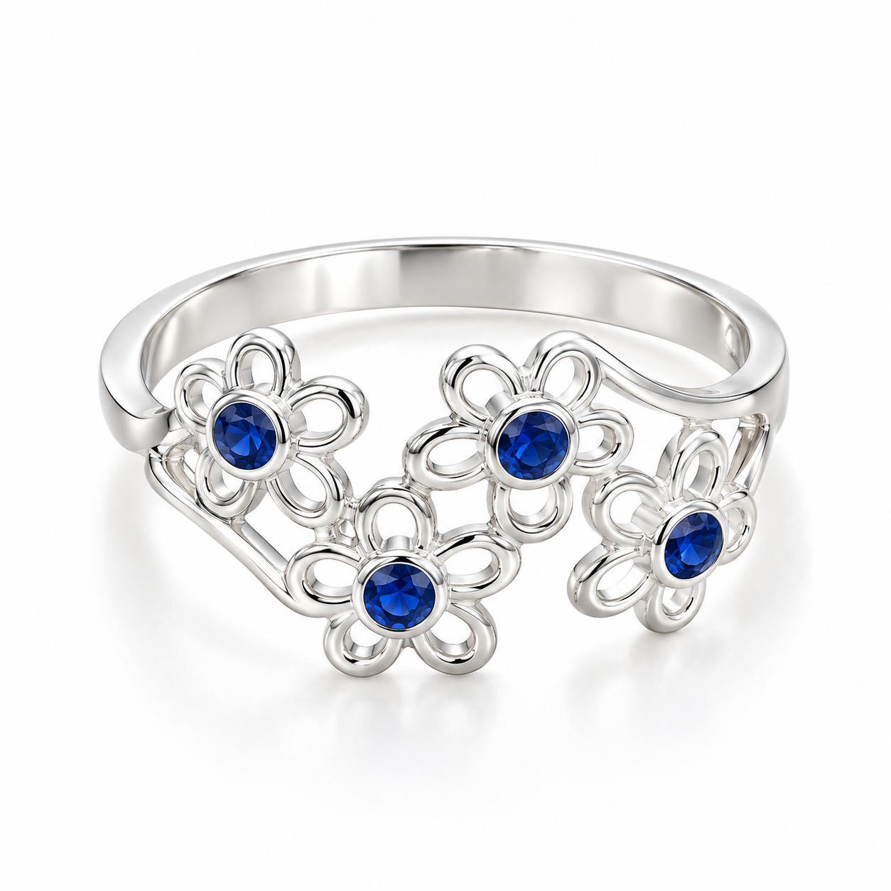 Anillo Flores con piedra azul fuerte  plata pieza