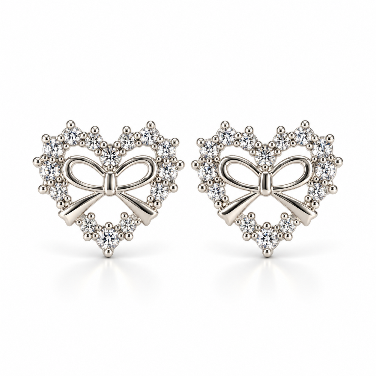 Arete Corazón con moño nudo plata pieza